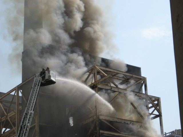 Calvert Tower 2 flows its master stream on the fire